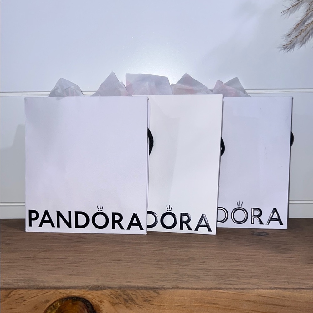 Pandora Elegant White Gift Bags With Pink Interior and Pandora Tissue Paper.